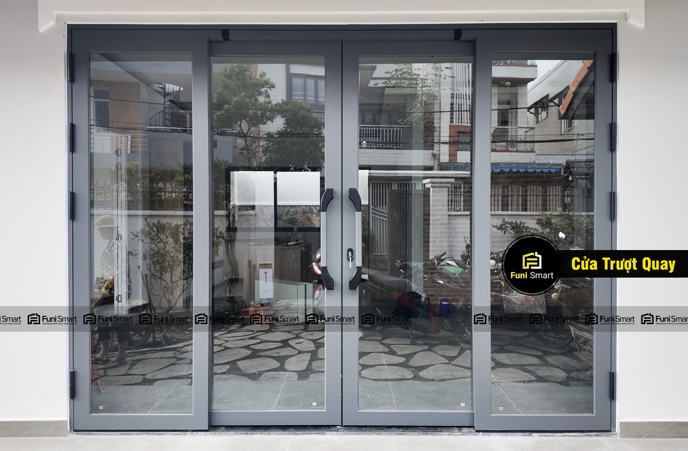 Cửa trượt quay nhôm kính cường lực đẹp hiện đại